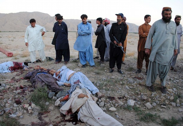 Local Pakistani residents gather around