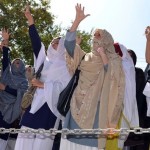 Pakistani Shiite Muslim students shout s