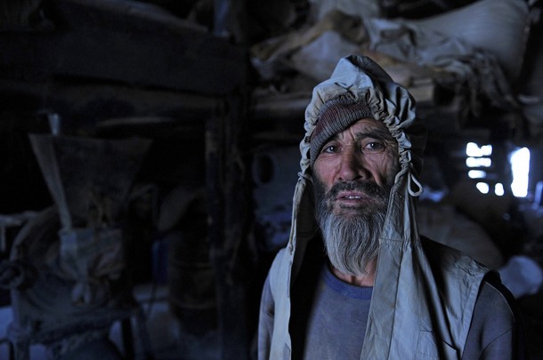 A Hazara labor A Hazara day labourer poses for the camera in Kabul's old quarter on June 8, 2011. Hazaras are Turkic people./ Photo by GETTY IMAGES