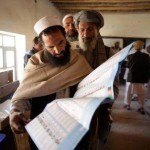 A Pashtun man looks up his desired candidate on the ballot as he queues to vote in Kabul. Saurabh Das / AP A Pashtun man looks up his desired candidate on the ballot as he queues to vote in Kabul. Saurabh Das / AP