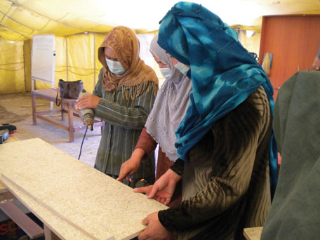 DSCN0897 Hazara women not strangers to tools of the trade.