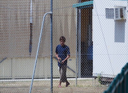 A teenage asylum seeker at the Phosphate Hill Detention Centre, Christmas Island. Photo: James Brickwood   Read more: http://www.smh.com.au/national/children-remain-challenge-in-malaysia-plan-20110912-1k629.html#ixzz1XkgVgRQK