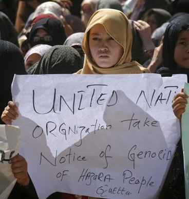 Reuters Pictures:   Ethnic Hazara Shi'ite women hold placards during a demonstration in Quetta September 21, 2011 to condemn the shootout by unidentified gunmen, a day earlier. Gunmen opened fire on a bus in Pakistan's southwestern province of Baluchistan in a suspected sectarian attack on Tuesday, killing at least 26 Shi'ite Muslim pilgrims traveling to Iran, police said.