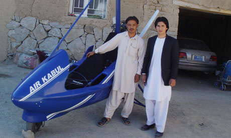 Sabir Shah (left), from the dicey province of Ghazni in Afghanistan, with his homemade microlight. Photograph: Jon Boone for the Guardian