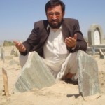 Juma Khan Rezai at his niece's grave in Ghazni. (Photo: Alizada)