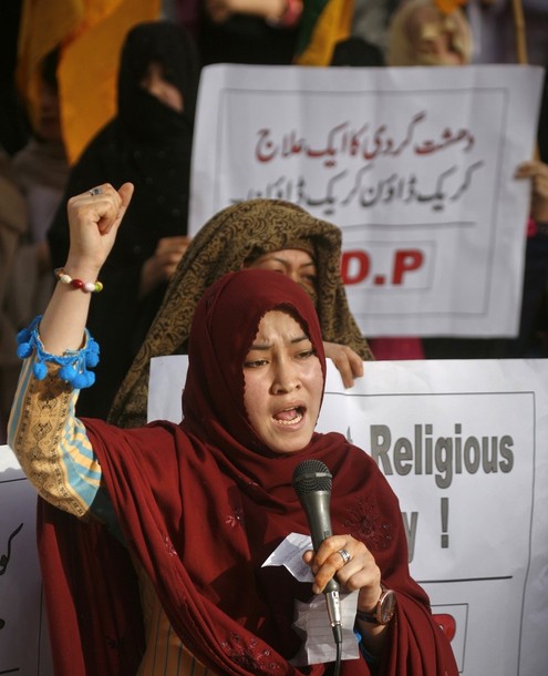 REUTERS PICTURES/ A Hazara women from Democratic Party (HDP) chants slogans during a demonstration against recent violence in Quetta April 2, 2012.