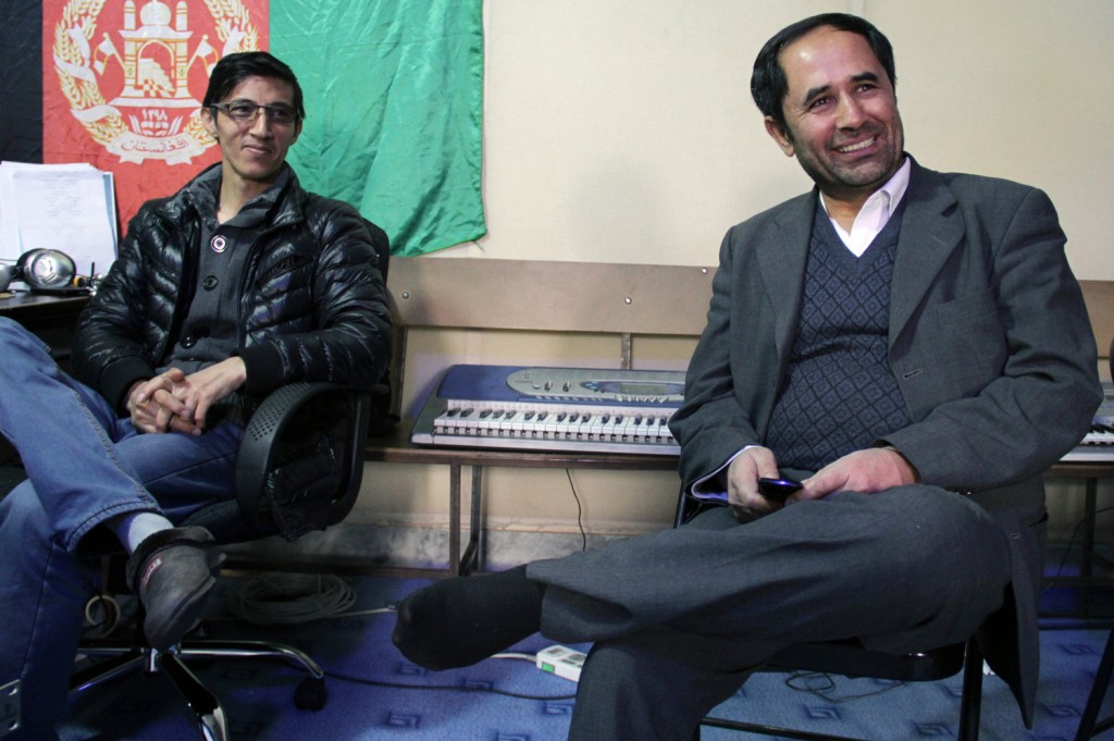 Royesh (right) visits music class. Zabihullah Tamanna for NPR